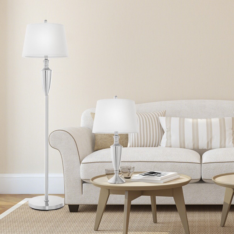 Elegant silver table lamp with linen shade, part of a 3-piece lamp set, perfect for adding style to any room.