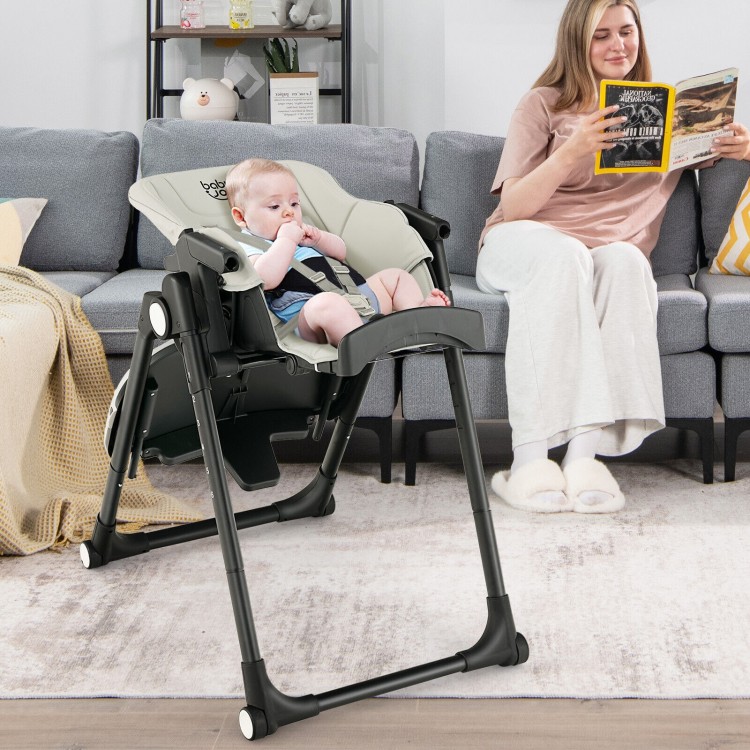 4-in-1 baby high chair in gray with adjustable height, removable trays, and rolling wheels for easy mobility and safety.