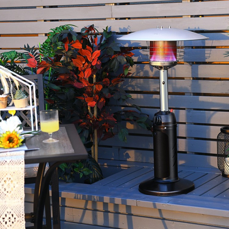 Portable tabletop propane patio heater in black, 11,000 BTU, ideal for outdoor warmth in courtyards and gardens.