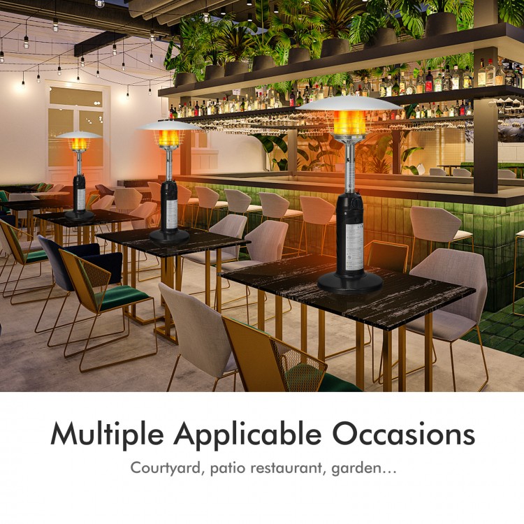Tabletop propane patio heater in black, 11,000 BTU, ideal for outdoor dining and gatherings in courtyards or gardens.