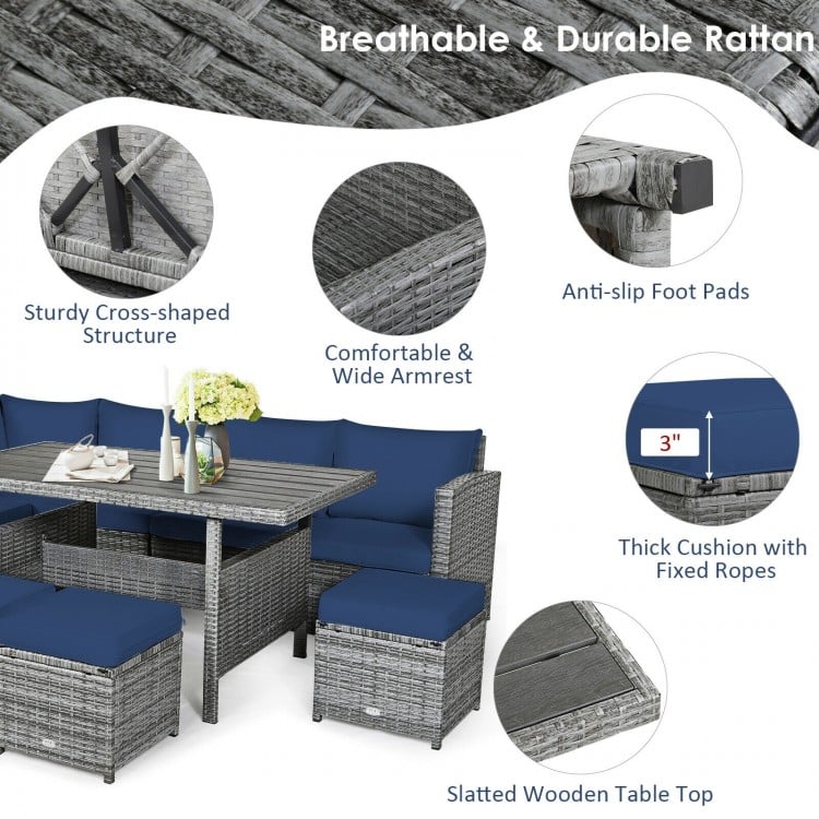7-piece patio rattan dining set with navy cushions, featuring a sturdy table and versatile corner chairs for outdoor.