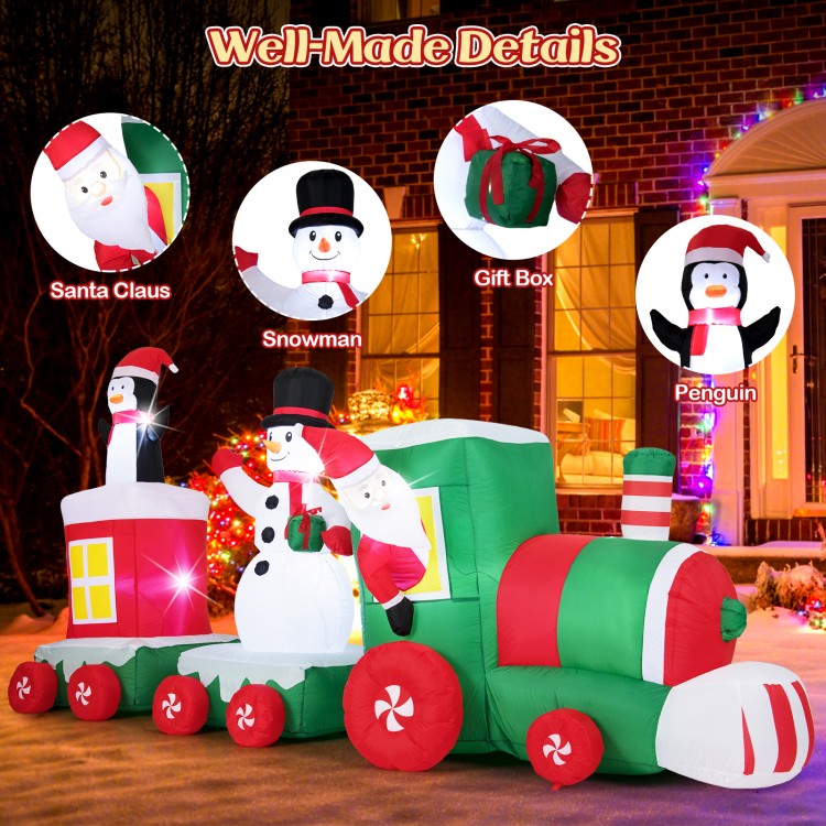 Christmas inflatable train featuring Santa Claus, snowman, and penguin, made of weather-resistant fabric for outdoor.