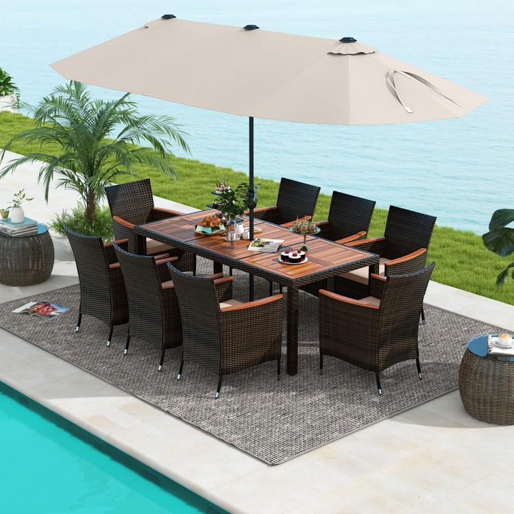 11-piece patio dining set featuring a large acacia wood tabletop, hand-woven PE rattan chairs, and a 15 ft umbrella for.