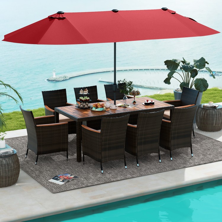 11-piece patio dining set featuring a 15-foot double-sided umbrella, hand-woven PE rattan, and acacia wood table for.