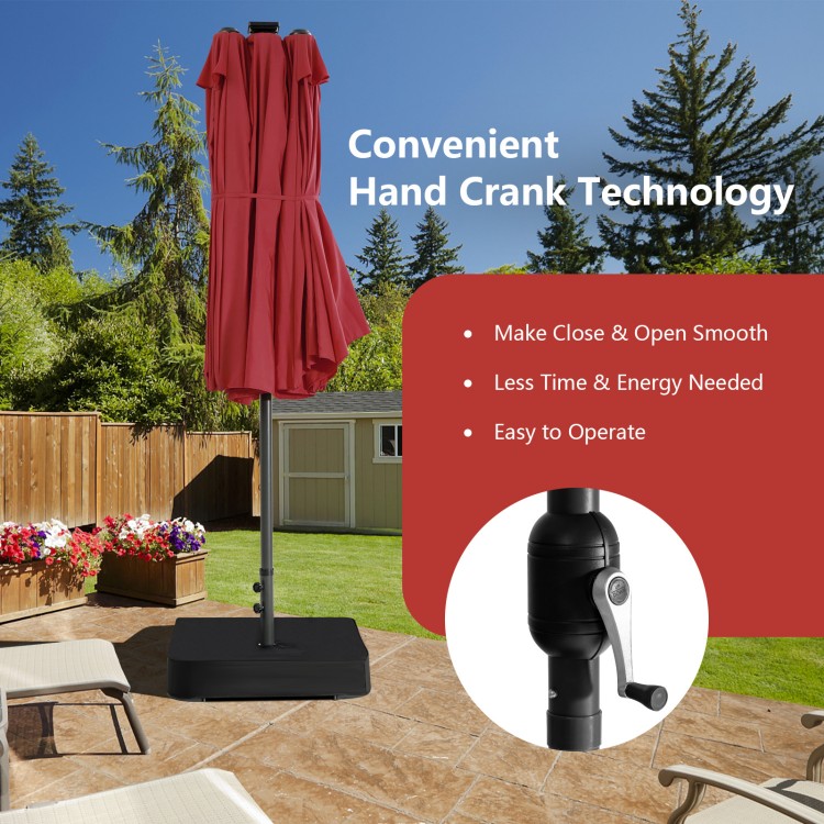 15-foot double-sided patio umbrella with hand crank, featuring a sturdy base for outdoor dining set shade and.