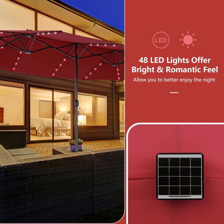 15-foot double-sided patio umbrella with 48 LED lights, providing ambiance for outdoor dining with a wine-colored.