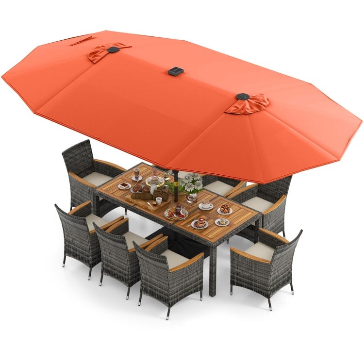 11-piece patio dining set featuring a 15-foot orange umbrella, acacia wood table, and comfortable rattan chairs for.