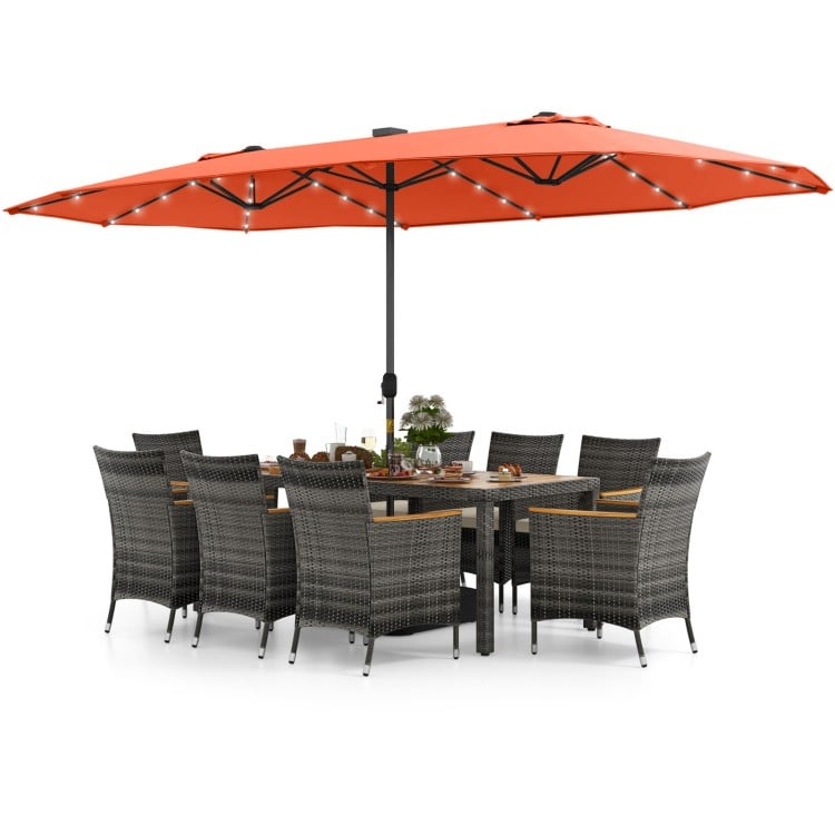Patio dining set with 11 pieces, featuring gray PE rattan chairs and a 15 ft orange double-sided umbrella for outdoor.