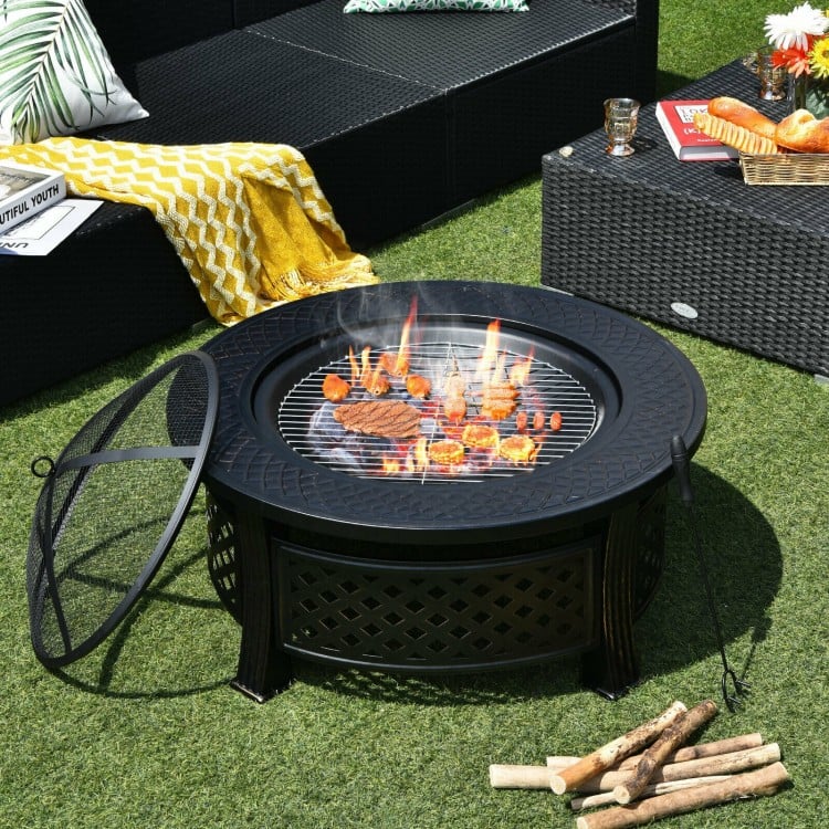 Outdoor fire pit with BBQ grill, high-temp finish, and mesh cover, perfect for backyard gatherings and easy maintenance.