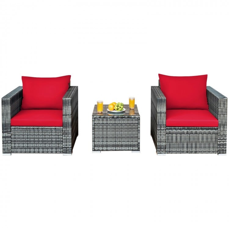 3-piece patio rattan furniture set with red cushioned sofas and glass-top table, perfect for outdoor relaxation.