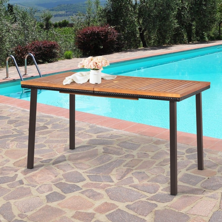 Acacia wood patio dining table with umbrella hole, perfect for outdoor gatherings, supporting up to 170 lbs.