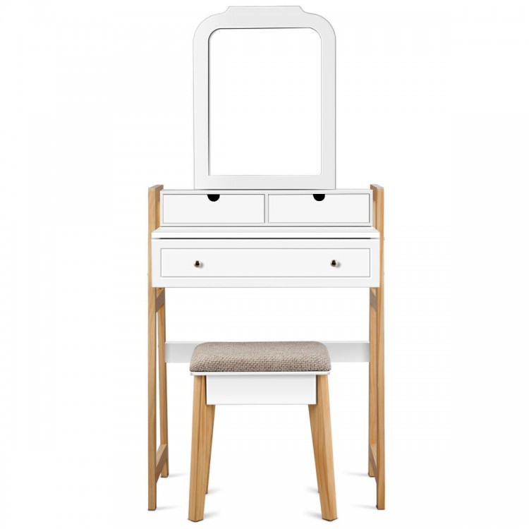 Vanity table set with cushioned stool, large mirror, and three drawers for organized storage and elegant home decor.