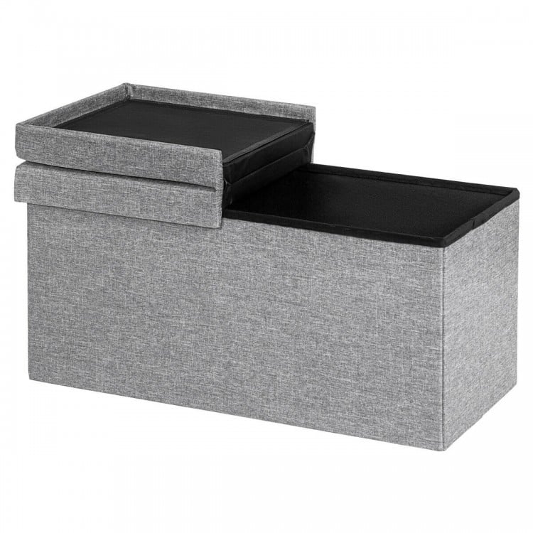 Light gray folding storage ottoman with lift top, sturdy MDF construction, spacious interior for blankets and shoes.