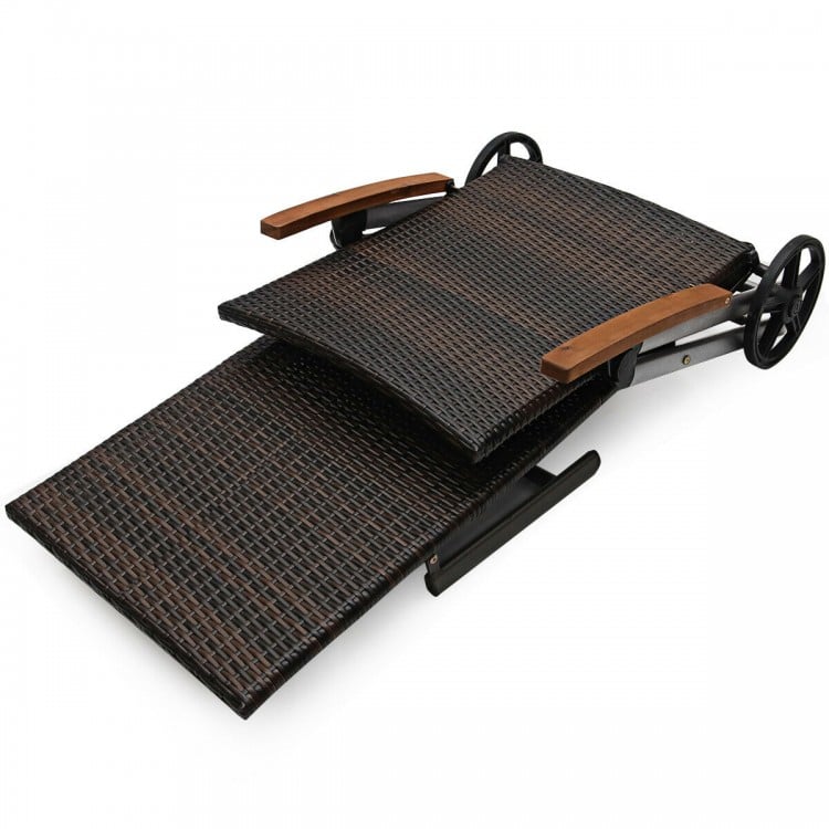 Folding outdoor rattan chaise lounge chair with adjustable backrest and wooden armrests, ideal for sunbathing and.