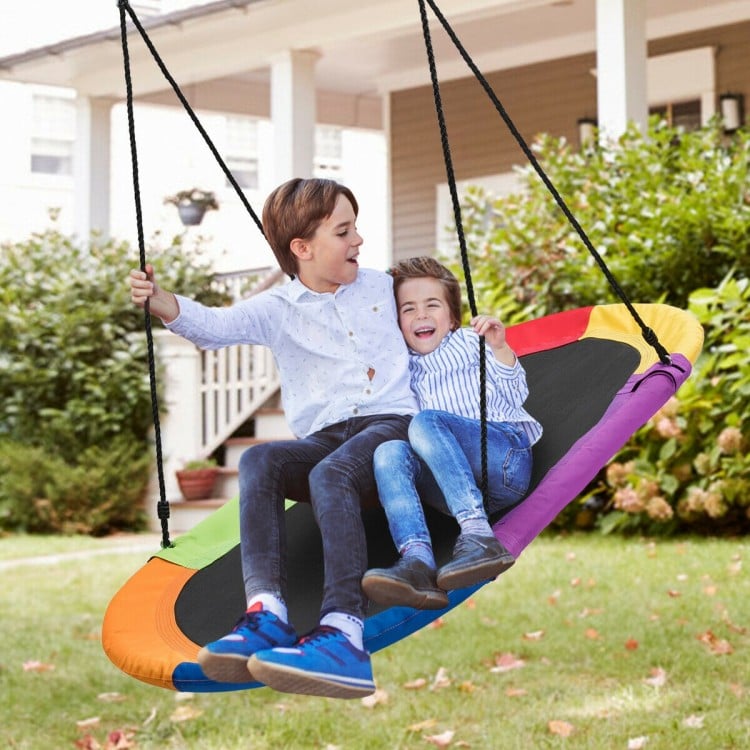 Oval 60-inch multicolor saucer swing with two children, adjustable height for outdoor fun and parent-child interaction.