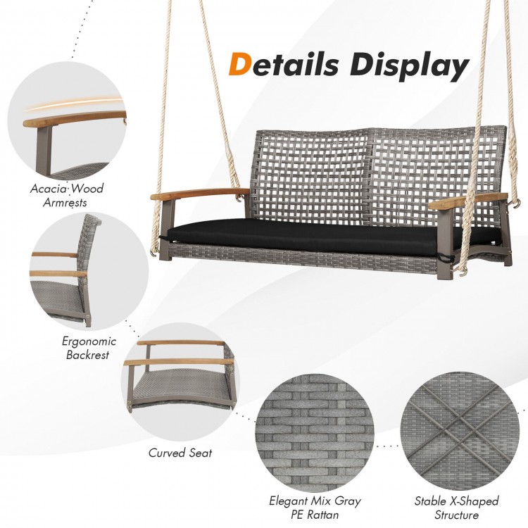 2-person patio wicker hanging swing chair with acacia wood armrests and ergonomic backrest, ideal for backyard.