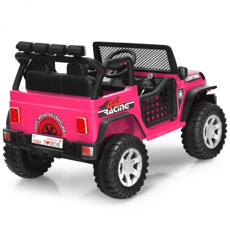 Rear view of the pink 12V kids electric ride-on truck showcasing its durable design and spacious seat for comfortable.