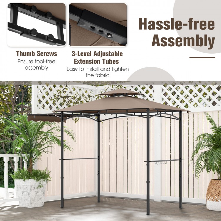 Grill gazebo with brown double-tiered top and adjustable extension tubes for easy assembly and added shade.