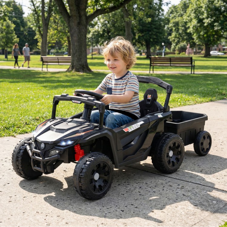 Battery-powered ride-on tractor in dark gray with detachable trailer, parent remote control, and kid-friendly features.