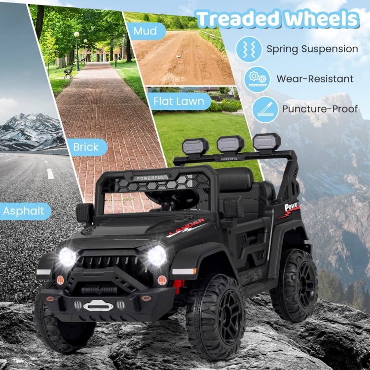 12V electric kids ride-on truck in black with treaded wheels, remote control, and soft start for stable driving.