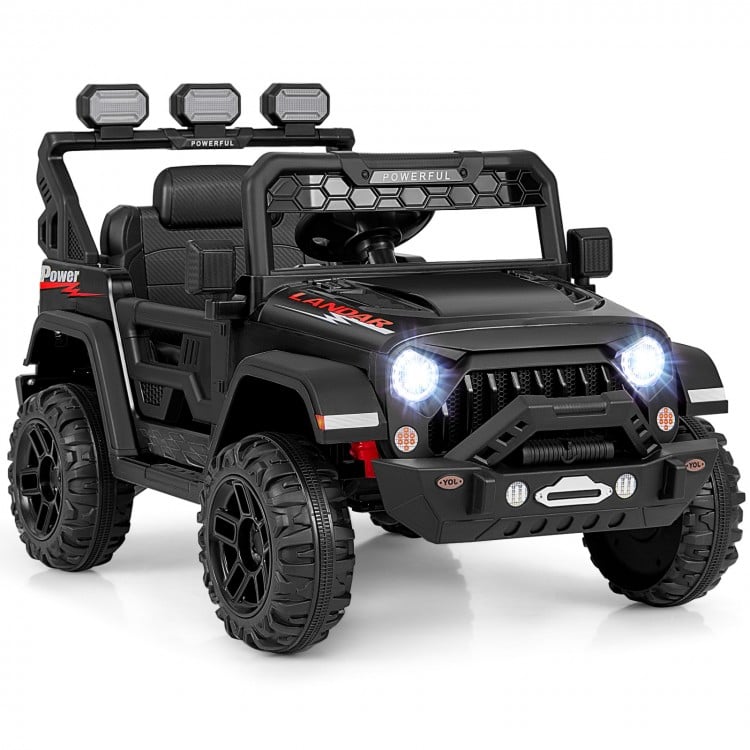 Front view of the black 12V electric kids ride-on truck with LED lights and sturdy treaded wheels for outdoor.