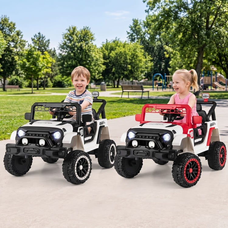 Two kids enjoy riding in the 12V Kids Ride on Truck with remote control, featuring bright lights and a smooth suspension.