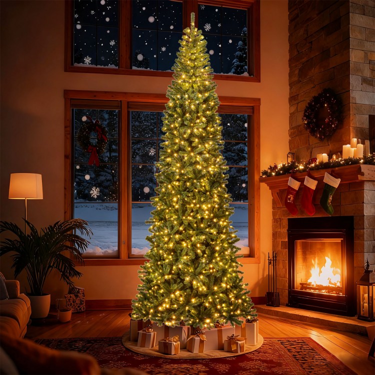 12 ft tall prelit artificial Christmas tree with 2536 PVC branch tips, glowing LED lights, perfect for festive indoor.