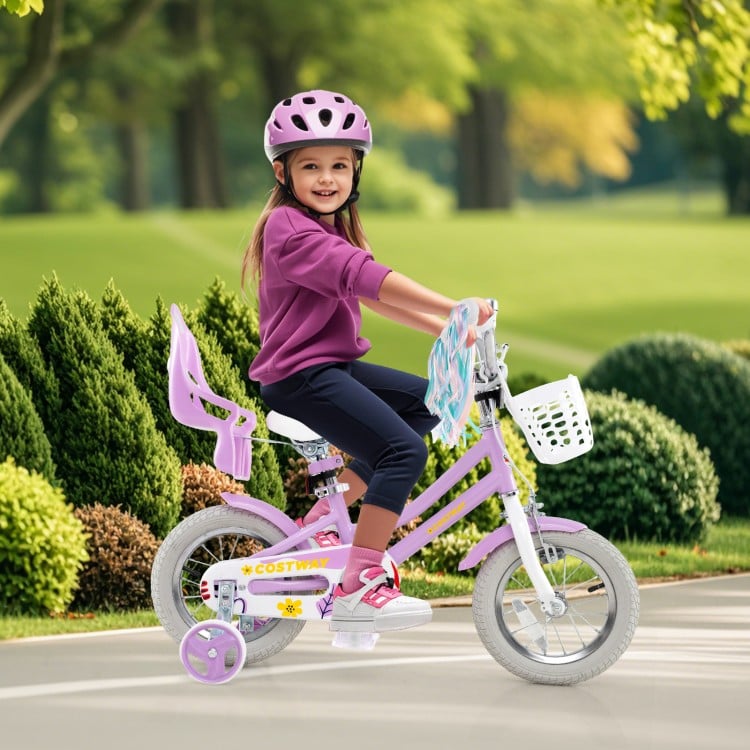 12-inch girls bike in pink with doll seat, streamers, and training wheels, perfect for children aged 3-4 years old.