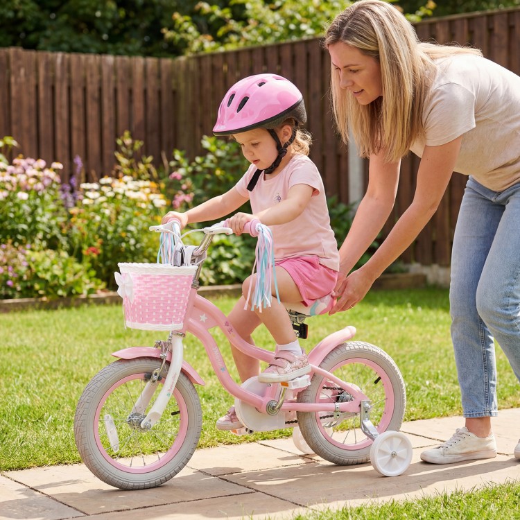 Pink 12-inch kids bike with adjustable seat, basket, and streamers, perfect for girls aged 3-4 years old.