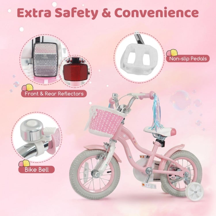 Close-up of the pink 12-inch kids bike with adjustable seat, basket, streamers, and safety reflectors for girls.