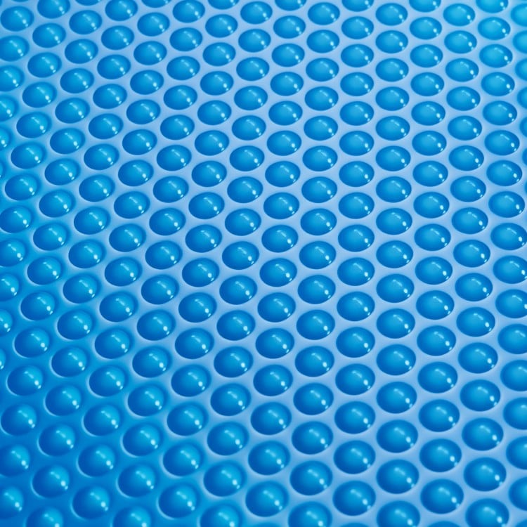 Close-up of a blue bubble cover made from high-quality PE material, designed to retain solar heat for above-ground.