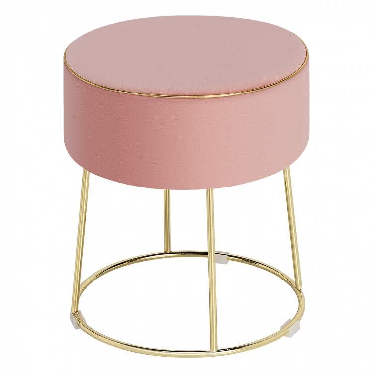 Round pink velvet footrest stool with gold metal frame, suitable for bedside use and versatile home decor.
