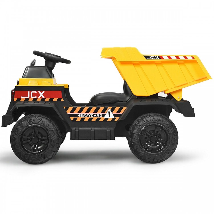 Side view of the yellow 12V kids ride-on dump truck with electric bucket and sturdy wheels for adventurous outdoor.