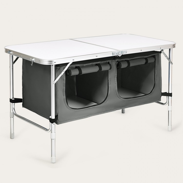 Height adjustable folding camping table in gray with large storage area, compact design, and reinforced structure for.