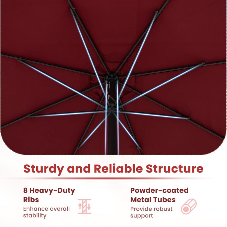 Underneath view of the 12 feet red patio umbrella showcasing 8 sturdy ribs and powder-coated metal tubes for stability.