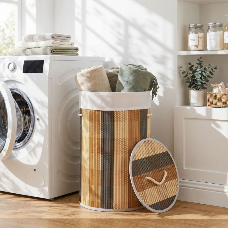 Multicolor 13.2-gallon laundry hamper with removable liner, bamboo frame, and lid for dust-free storage in a laundry.