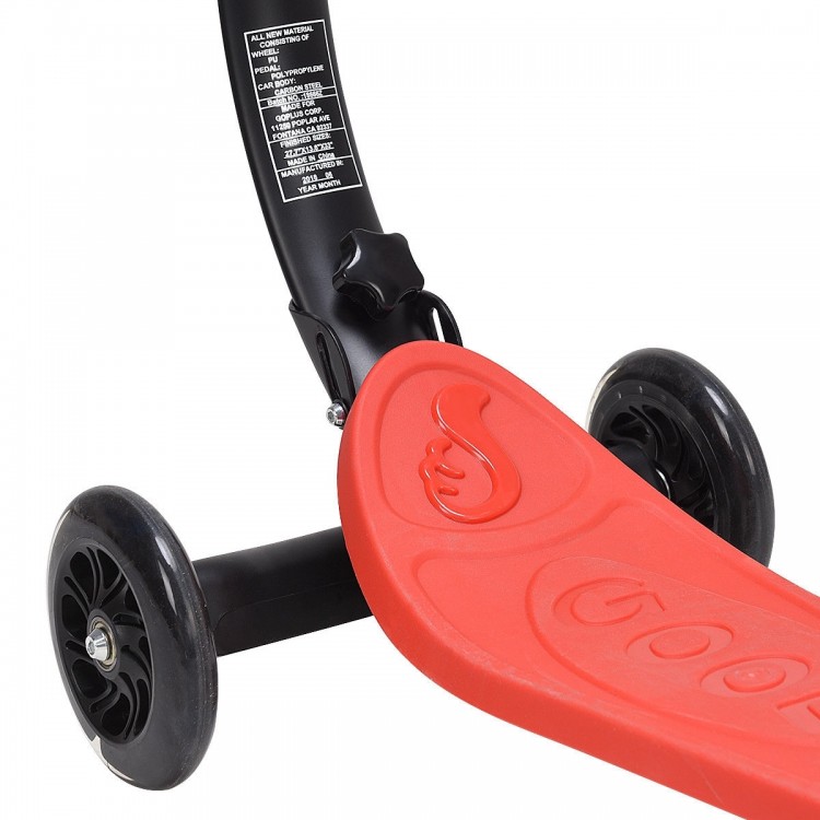 Close-up of the red folding kids scooter's wide raised deck and curved handlebar, designed for balance and safety.