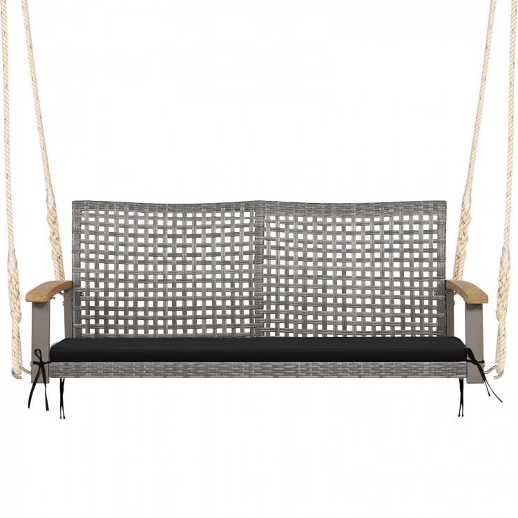 Wicker hanging swing chair for two, featuring gray PE rattan, acacia wood armrests, and a comfortable black cushion.