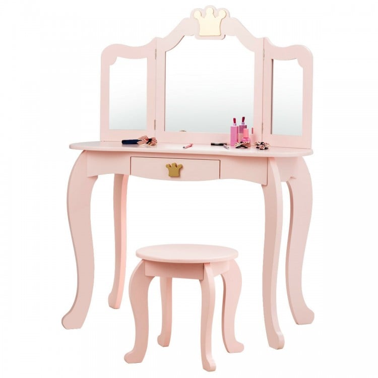 Kids makeup dressing table in pink with tri-folding mirror and stool, perfect for a child's bedroom or playroom.