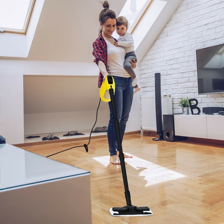 Handheld steam cleaner in yellow with ergonomic handle, cleaning hardwood floor, featuring child lock and 14-piece.