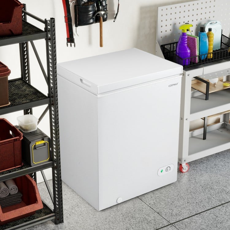 Compact 141 L chest freezer in white with adjustable temperature, removable basket, and top stay-open door for easy.