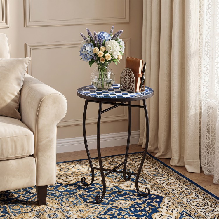 Round blue mosaic accent table with a floral clover design, featuring a robust metal frame for indoor or outdoor use.