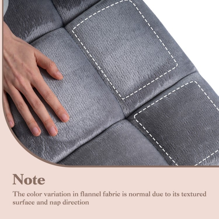 Close-up of the light gray cushioned floor chair, showcasing its soft flannel fabric texture and padded design for.