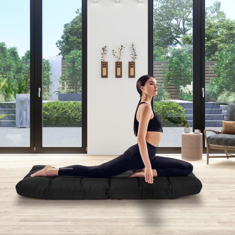 Adjustable black gaming sofa in a yoga pose, featuring breathable fabric and ergonomic design for comfort and support.