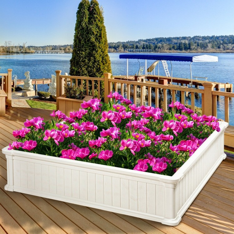 Large 48-inch white raised garden bed planter filled with pink flowers, perfect for outdoor patios and gardens.