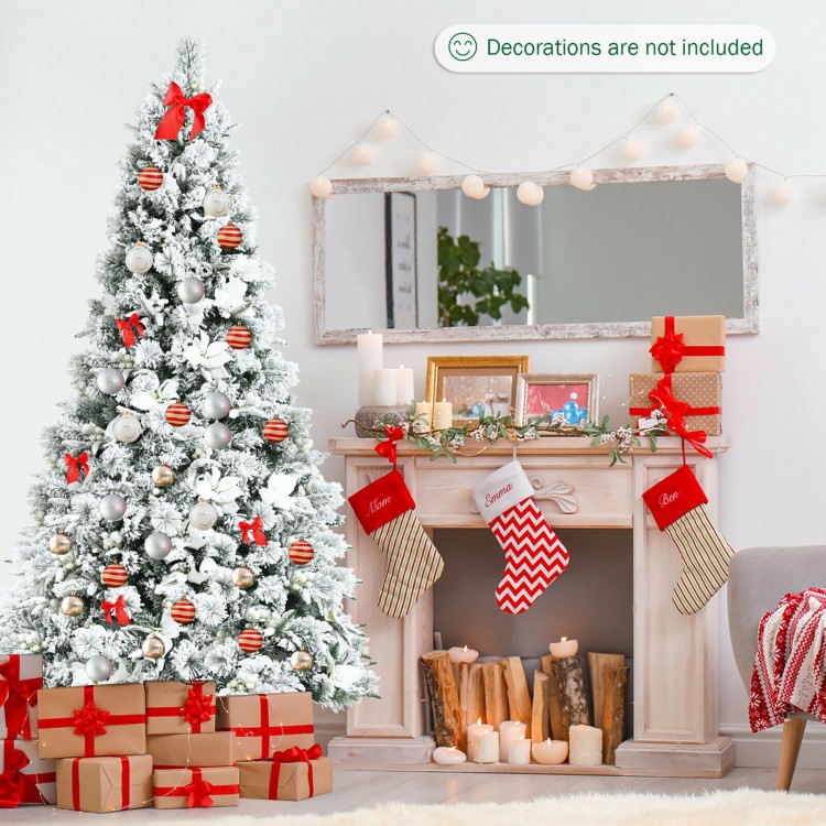 7 feet snow flocked Christmas tree with white berries and poinsettia flowers, perfect for festive home decoration.