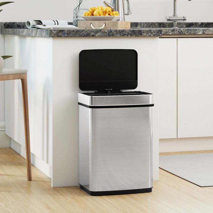 16-gallon silver trash can with infrared motion sensor, dual compartments, and soft closing lid for convenient waste.