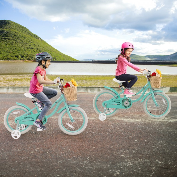 Two kids riding a green 16-inch bike with training wheels and a front basket, perfect for outdoor fun and balance.