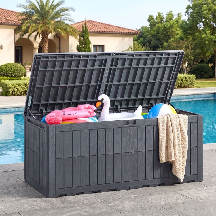 Gray 180 Gal outdoor deck box with lid, ideal for pool supplies and garden tools, featuring a lockable design and.