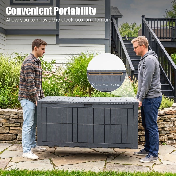 Two men lifting the 180 Gal gray outdoor deck box with side handles, showcasing its portable and lockable design.